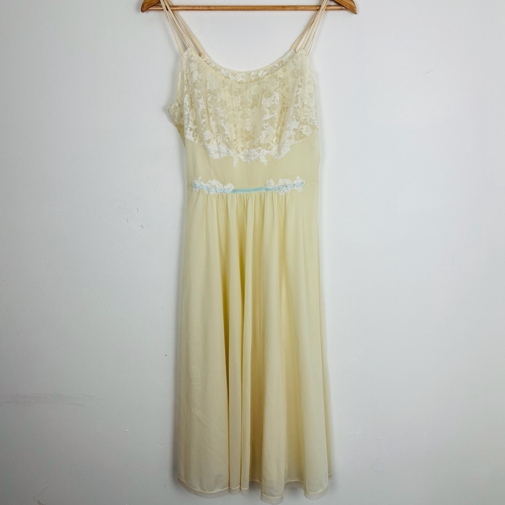 Vintage ivory slip dress. Lace at bust with pastel blue velvet ribbon detail. 36